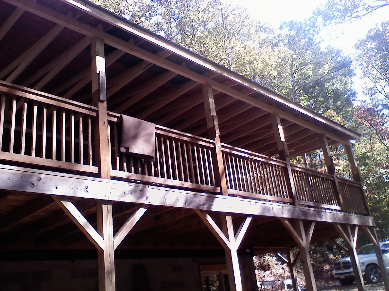 Timber framing under a new elevated porch and deck — Roof Leak Repair in East Galesburg by Roofing Brothers